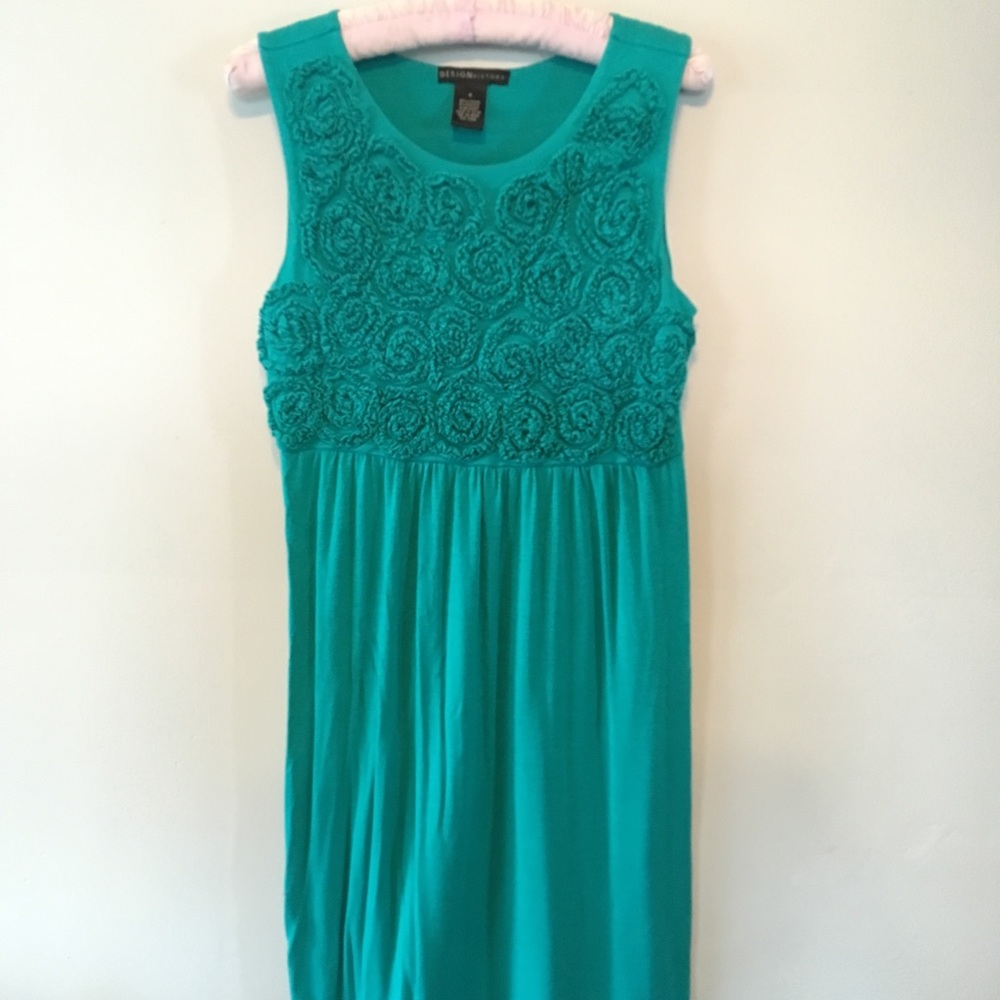 Teal dress with flowered accents on top